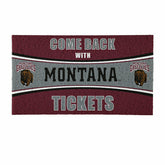 28" x 16" PVC Trapper Mat, Come Back with Tickets, University of Monta, Collegiate